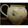 Image 1 : A Poole Pottery Jug, decorated flowers, 16 cm