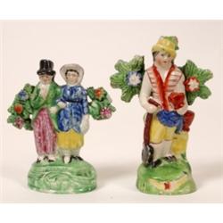 An Early 19th Century Hollow Base Staffordshire Group, "Dandie", 11 5 cm and another similar figure,