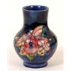 Image 1 : A Moorcroft Iris Pattern Vase, 10 cm