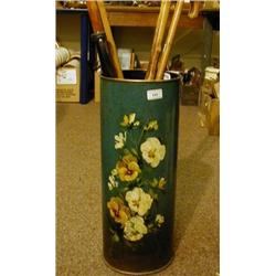 A Painted Metal Stick Stand, decorated pansies, 55 cm and a group of walking sticks