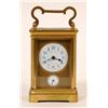 Image 1 : A Brass Carriage Clock, with alarm, the enamel dial with Arabic numerals, signed "Harrods Ltd", with