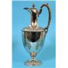 Image 1 : A Victorian Plated Claret Jug, with pineapple finial, and acanthus leaf capped scroll handle, the bo