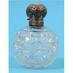 A Victorian Cut Glass Scent Bottle, the silver mount decorated scrolling foliage, Birmingham 1889,