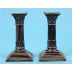 A Pair of Late Victorian Silver Corinthian Column Candlesticks, on stepped square bases, Sheffield 1