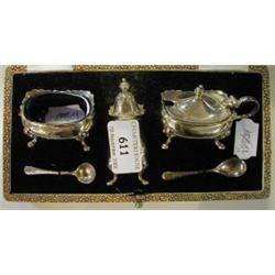 A Set of Three Silver Condiments, of 18th century design, on pad legs, with two spoons, boxed, Birmi