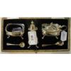 Image 1 : A Set of Three Silver Condiments, of 18th century design, on pad legs, with two spoons, boxed, Birmi