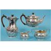 Image 1 : A Victorian Silver Four Piece Tea Service, crested, with scrolling foliage and reeded lower bodies,