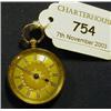 Image 1 : A 14ct Gold Fob Watch, with engraved decoration and Roman numerals