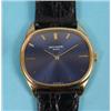 Image 1 : A Patek Philippe 18ct Yellow Gold Wristwatch, with a blue dial, on a Patek Philippe leather strap an