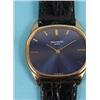 Image 3 : A Patek Philippe 18ct Yellow Gold Wristwatch, with a blue dial, on a Patek Philippe leather strap an