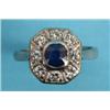 Image 1 : An 18ct White Gold Ring, having a sapphire within a surround of eight diamonds See illustration