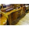 Image 1 : A George III Style Mahogany Serpentine Front Sideboard, having two central drawers flanked by a pair