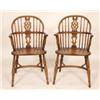 Image 1 : A Set of Four Windsor Style Kitchen Armchairs, with pierced splats, crinoline stretchers, and turned