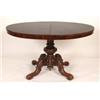 Image 1 : An Early Victorian Rosewood Centre Table, with turned column on a four carved legs, 136 cm See illu