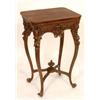 Image 1 : A 19th Century Continental Work Table, the rectangular rosewood lift up top above gilt decorated cab