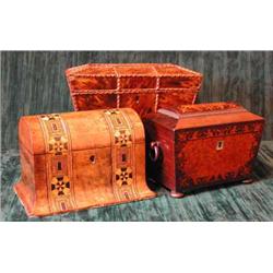 A 19th century tortoiseshell sarcophagus form tea caddy with hinged lid...