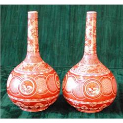 A pair of well decorated late 19th century Japanese Kutani bottle vases...