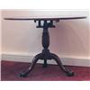 Image 1 : A George III mahogany snap top table with circular top, birdcage action and well carved tripod b...