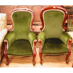 A Victorian mahogany framed gentleman's spoon back armchair with matching lady's armchair...