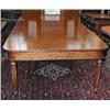 Image 1 : A good early 19th century mahogany dining table with two extra leaves, on turned reeded supports...