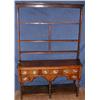 Image 1 : A good 18th century oak dresser with open plate rack above five drawers and undertier...