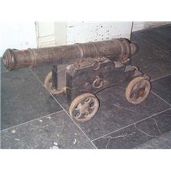 A PAIR OF REGENCY IRON CANNONS, EARLY 19th CENTURY, the barrels 88cms long, on timber and ir…