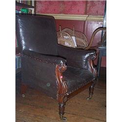 AN IRISH WILLIAM IV ROSEWOOD BERGÈRE, by WILLIAMS & GIBTON, circa 1835, the rectangular padded back.