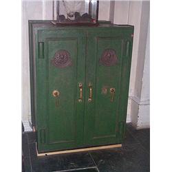 A VICTORIAN GREEN-PAINTED CAST-IRON SAFE, by MILNERS of LIVERPOOL & LONDON, third quarter 19th centu