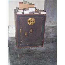 A VICTORIAN RED AND BLACK-PAINTED CAST-IRON SAFE, by MILNERS of LIVERPOOL & LONDON, third quarter 19