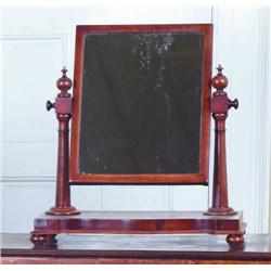 A WILLIAM IV MAHOGANY DRESSING MIRROR, circa 1835, with rectangular swing plate between turned colum