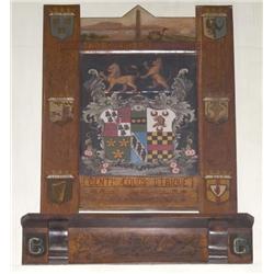 AN IRISH LATE VICTORIAN PAINTED OAK ARMORIAL TABLET, LATE 19th CENTURY, centred by the armorial achi