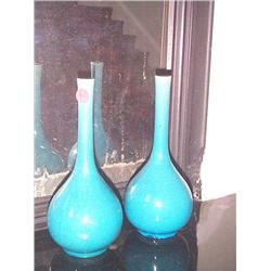 A PAIR OF BLUE-GLAZED ORIENTAL BOTTLE FLASKS. (2), 24cms high., e50/100...