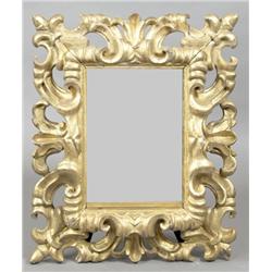 A FLORENTINE CARVED GILTWOOD PICTURE FRAME,, LATE 17th/18th CENTURY, with deeply moulded and pierc..