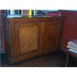 A VICTORIAN OAK SIDE CABINET, circa 1860, with moulded rectangular top above a pair of diagonally-bo