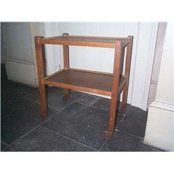 A STAINED-OAK TROLLEY, 20th CENTURY, 69cms., e50/100...