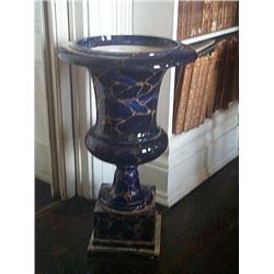 A FRENCH PORCELAIN 'FOND LAPIS', MARBLEISED CAMPANA-SHAPED URN, on pedestal, in imitation of lapis..