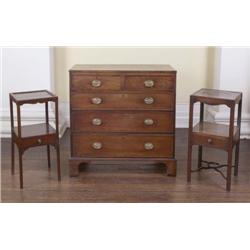 A REGENCY MAHOGANY AND EBONY-INLAID CHEST, circa 1810, of two short and three long drawers, on brack