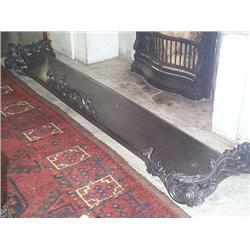 A WILLIAM IV CAST-IRON FENDER OF, SERPENTINE RECTANGULAR OUTLINE,, circa 1835, with pierced foli...