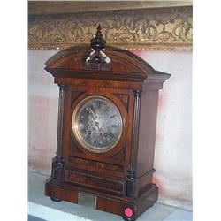 A VICTORIAN MAHOGANY MANTEL CLOCK, circa 1885, of architectural form with silvered circular dial, wi