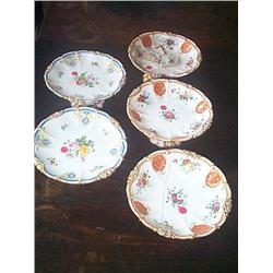 A SET OF THREE FRENCH FRUIT COMPORTS, circa 1835, by ED HONORÉ, gilded, painted with flowers, with s