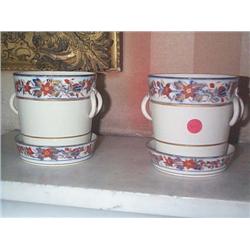 A PAIR OF CACHE-POTS AND STANDS,, PROBABLY WORCESTER, EARLY 19th CENTURY, with borders of flowers...