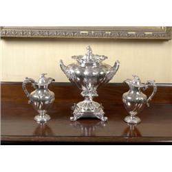 A PAIR OF WILLIAM IV PLATED CLARET EWERS, circa 1830, the spiral fluted bodies engraved with Gore-Bo