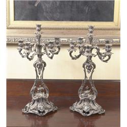 A PAIR OF VICTORIAN PLATED SIX-LIGHT, CANDELABRA, MID 19th CENTURY, with open waisted stands fille..