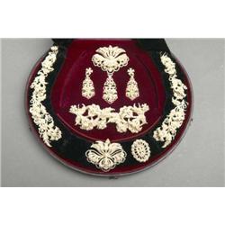 A SEED PEARL SUITE ON MOTHER OF PEARL BACKING, e2,000/2,500, A note preserved with these pearls...