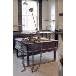 A WILLIAM IV STAINED-PINE KITCHEN TABLE, circa 1835, with frieze drawer on square legs joined by str
