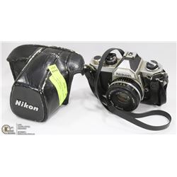VINTAGE NIKON 35MM CAMERA W/ NIKKOR 50 LENSE