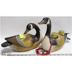 PAIR OF DECORATIVE DUCKS, ONE IS A CANDLE HOLDER