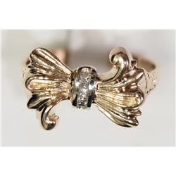 #22-10K Y&W GOLD DIAMOND BOW SWIRL STYLE RING