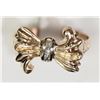 Image 1 : #22-10K Y&W GOLD DIAMOND BOW SWIRL STYLE RING