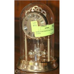 HEIRLOOM PERPETUAL MOTION CLOCK